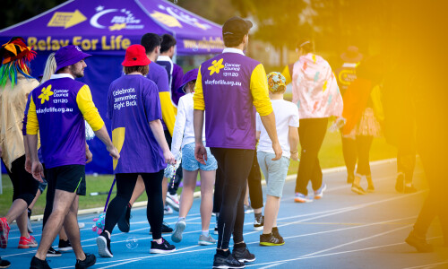 People wearing Cancer Council shirts participate in Reay for Life